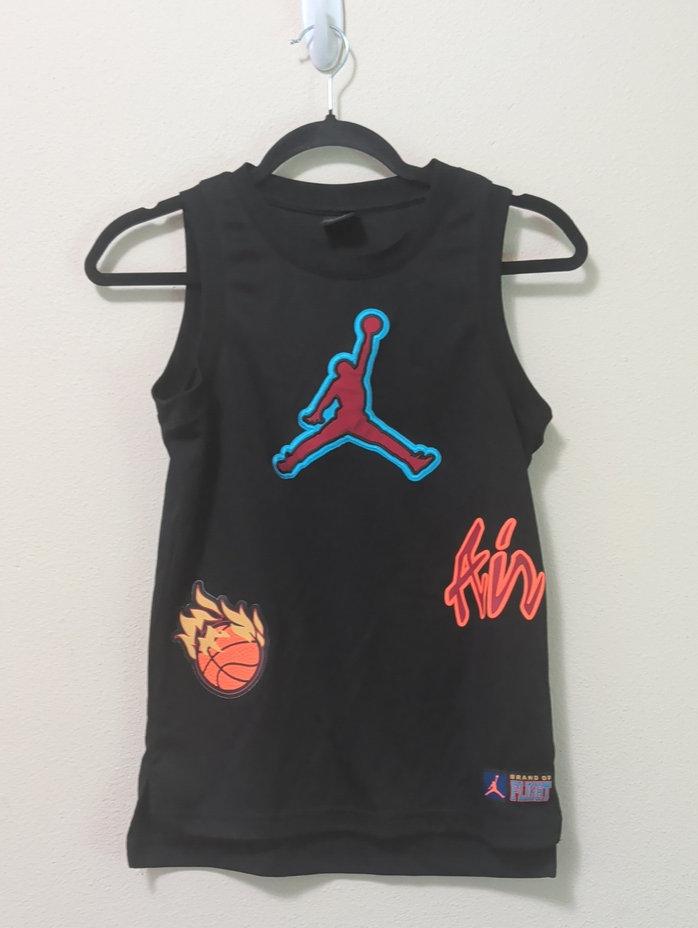 Jordan Black Tank Top with Red & Blue Jumpman and Orange Accents